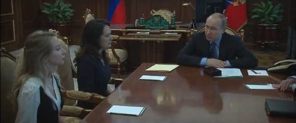 Putin meets the widows of the two Russian journalists killed to explain why the swap had to be done.