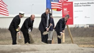From left US Vice Admiral James D Syring, Romanian President Traian Basescu , US Undersecretary of Defense for Policy James N Miller, and Romanian Defense Minister Mircea Dusa shovel sand during the official ground breaking ceremony of an U.S. Aegis Ashore missile defense base in Deveselu, Romania, Oct. 28, 2013 (file photo)