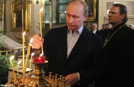 Putin in a Russian church