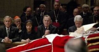 Bush and Clinton, front row seats at the Pope's funeral. 