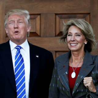 Betsy Devos with the man to be