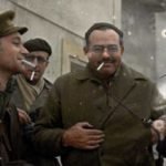 Hemingway with two officers