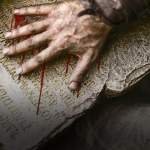 In what language did God write the Ten Commandments?