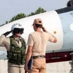 Russians salute in Syria