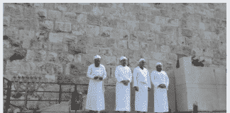 Kohanim stand in front of the altar – constructed for use in the Third Temple – and other vessels. (Credit: Adam Eliyahu Berkowitz/Breaking Israel News)
