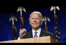 Biden stands against the RKM’s TV Clown